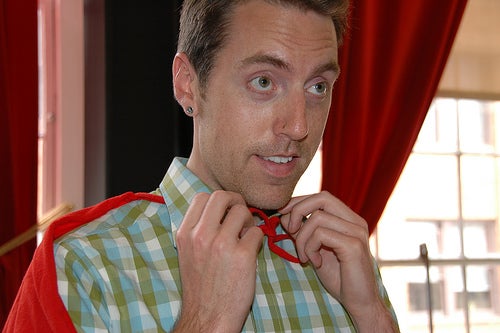 Man in a Plaid Shirt with a Red Cape for Article on Top Places to Find Jobs Online