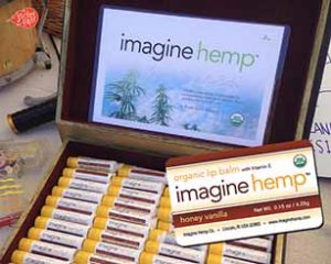 Box-of-Imagine-Hemp-lip-balm-with-a-custom-logo-sticker-they-had-printed-at-StickerGiant