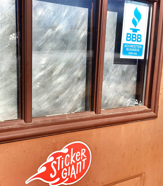 Better Business Bureau stickers on the door of StickerGiant