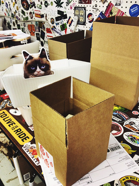 Grumpy-Cat-custom-shaped-sticker-in-shipping-boxes-at-the-StickerGiant-factory