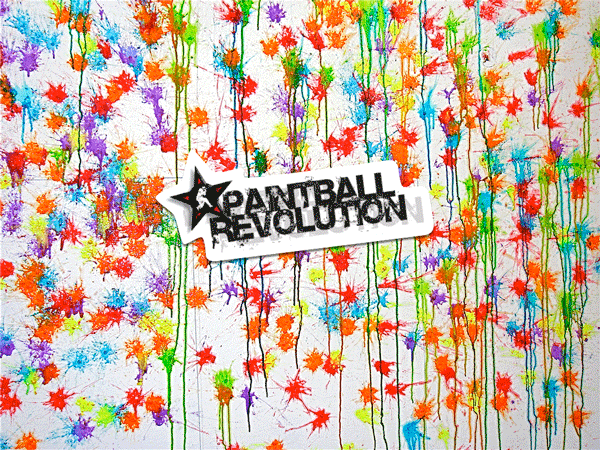 Custom-shaped-die-cut-sticker-for-Paintball-Revolution-printed-by-StickerGiant-in-front-of-a-paintball-wall