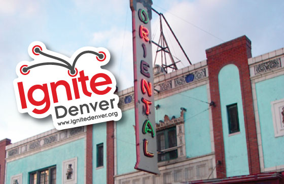 Custom-Ignite-Denver-sticker-sponsored-by-StickerGiant-in-front-of-the-Oriental-Theater-in-Denver-CO